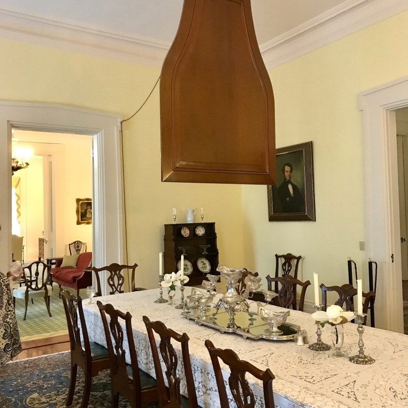 a room filled with furniture and a table