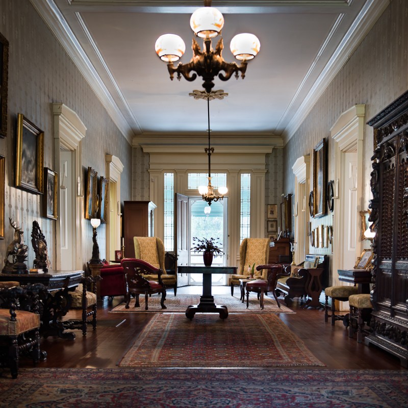 a room filled with furniture and a fireplace