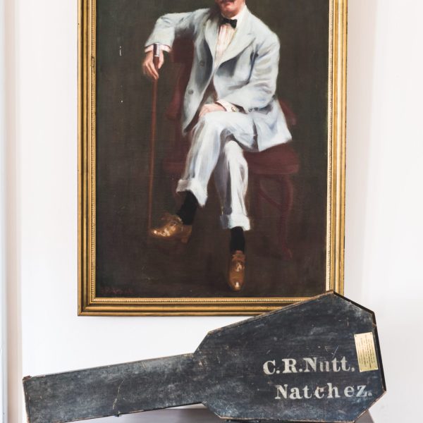 a man standing in front of a mirror posing for the camera