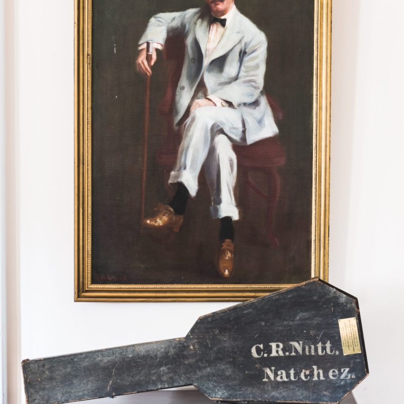 a man standing in front of a mirror posing for the camera