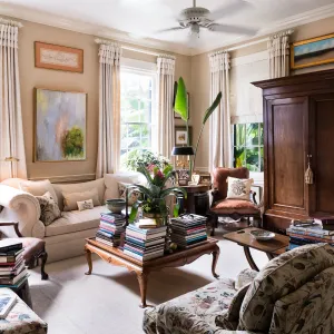 a living room filled with furniture and a fire place