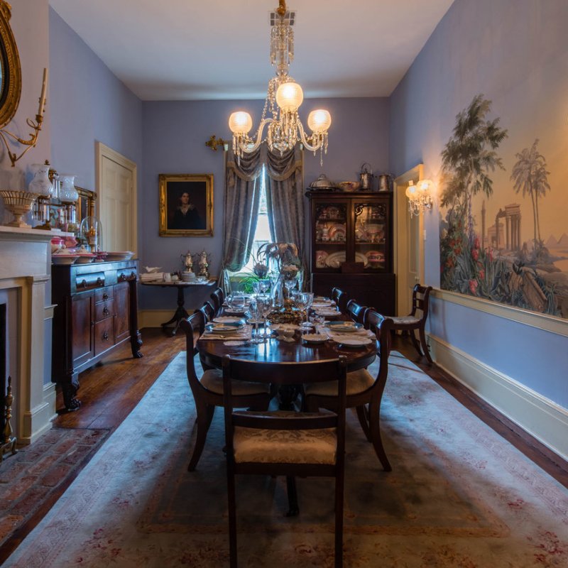 a living room filled with furniture and a fireplace