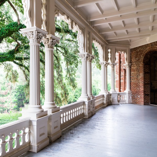 a room filled with furniture and a large window