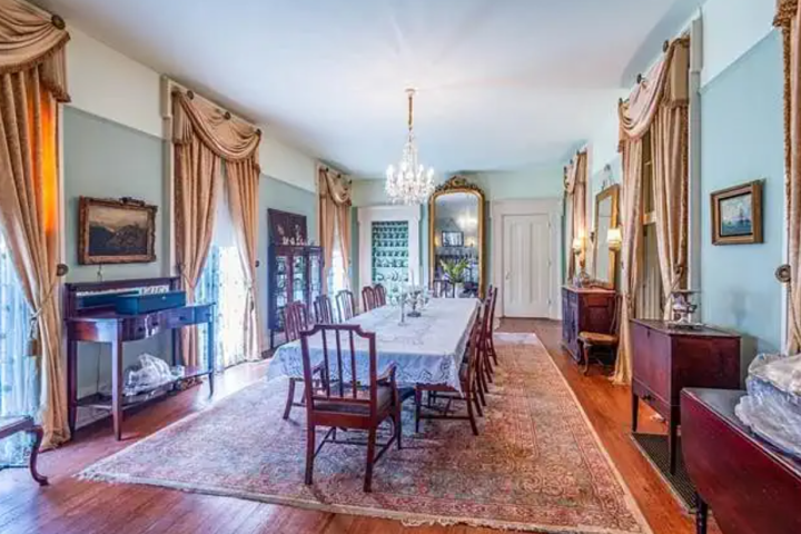 a living room filled with furniture and a fireplace