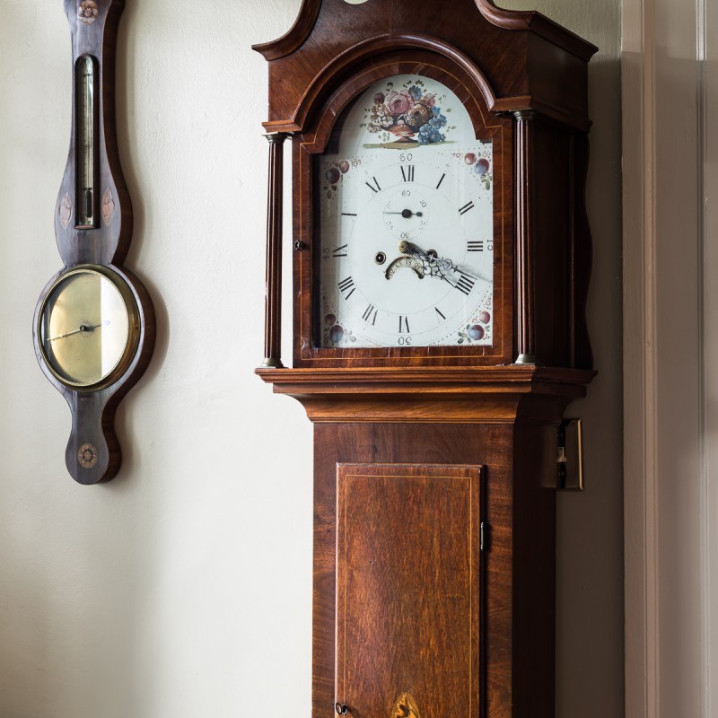 a clock hanging on the wall