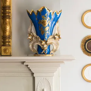 a vase of flowers on a table