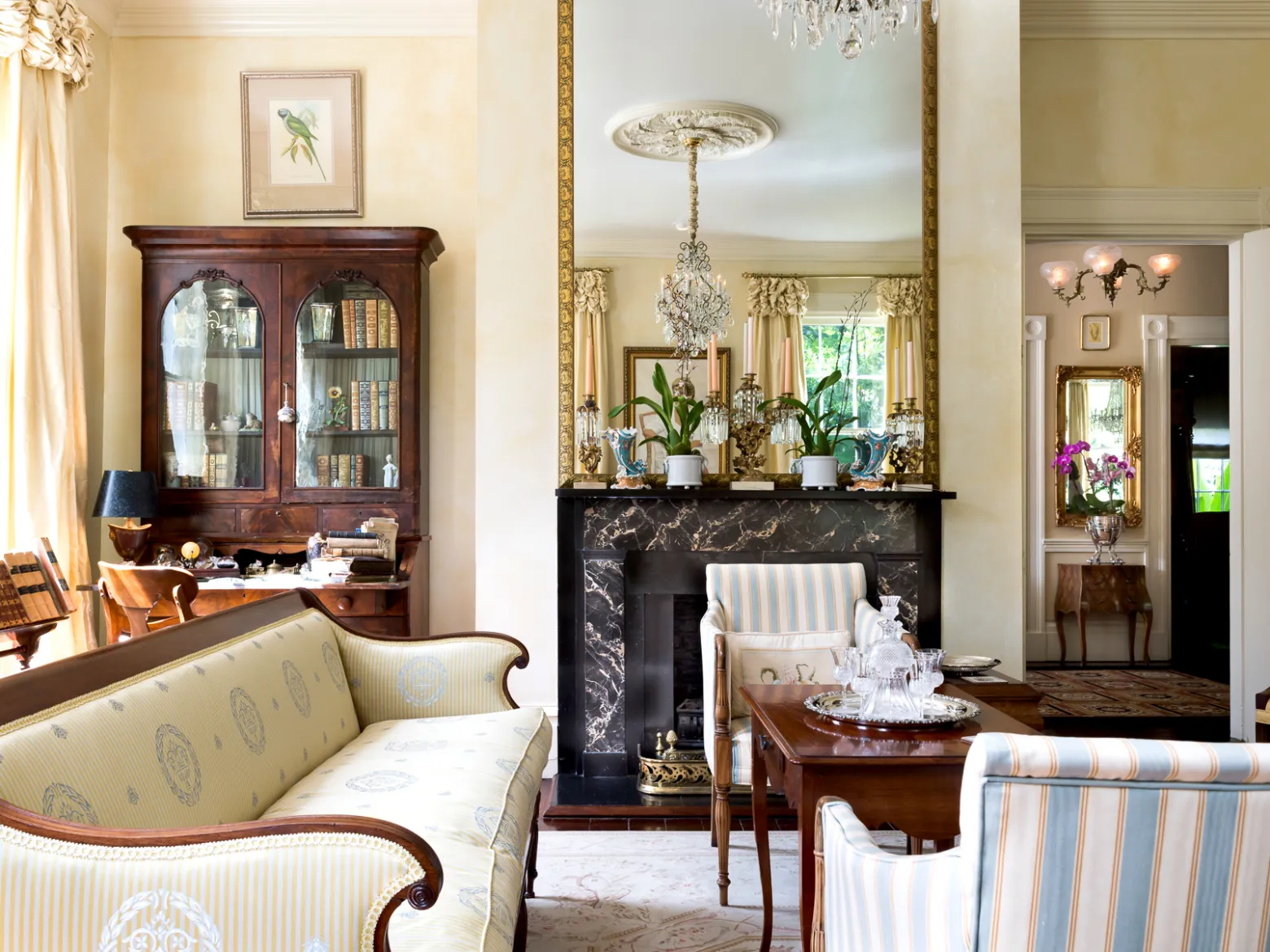 a living room filled with furniture and a fire place