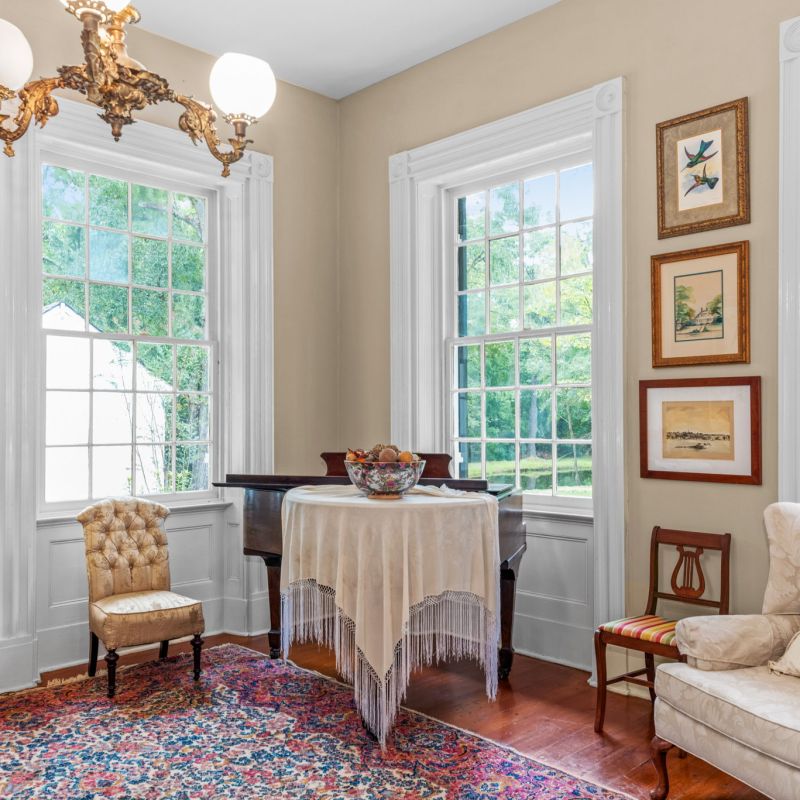 a living room filled with furniture and a fire place