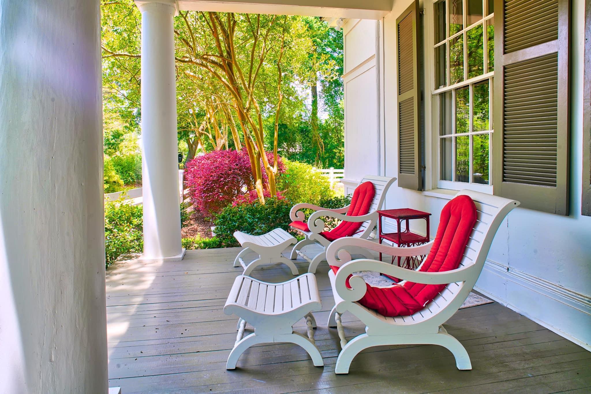 a chair sitting in front of a window