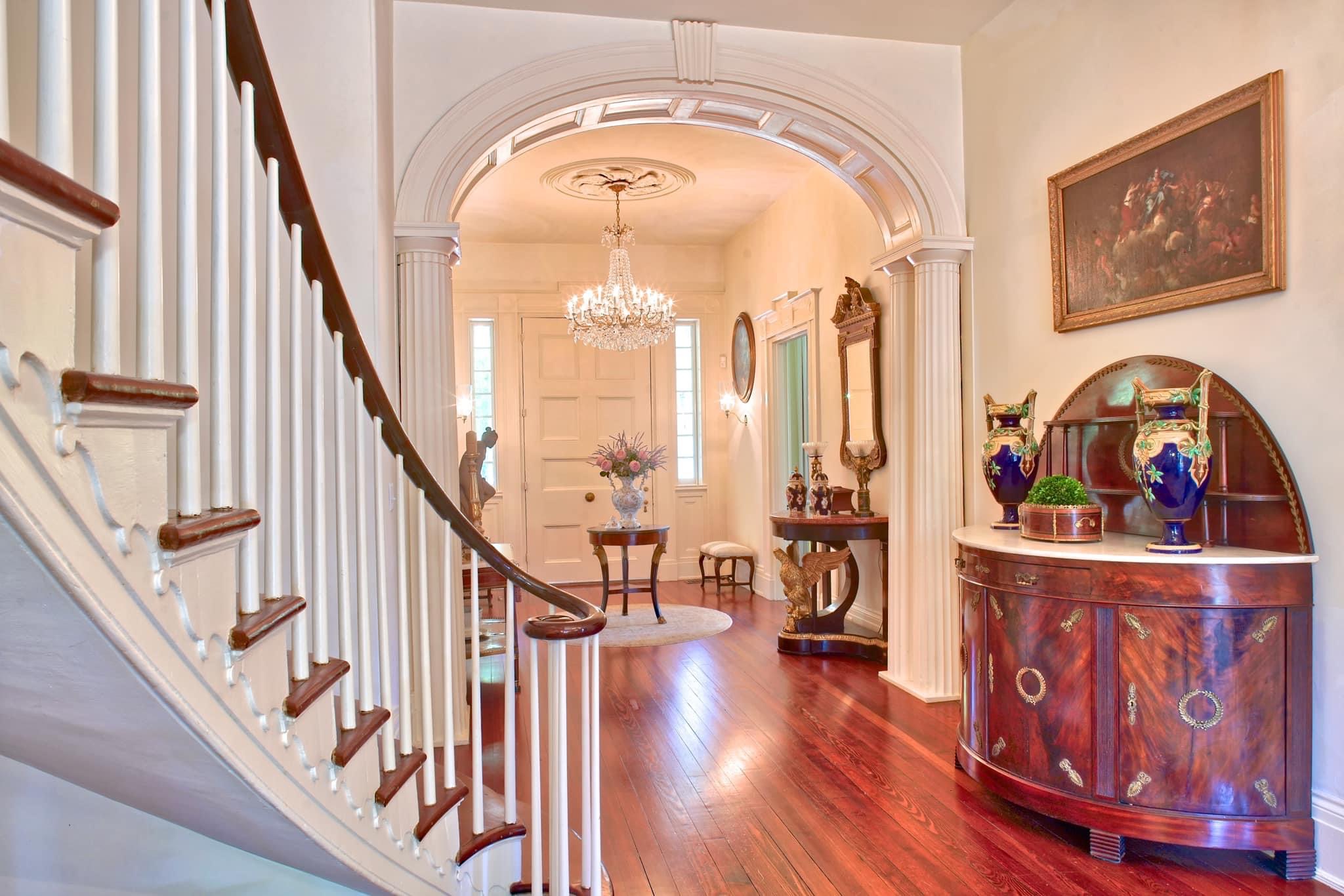 a room filled with furniture and a clock