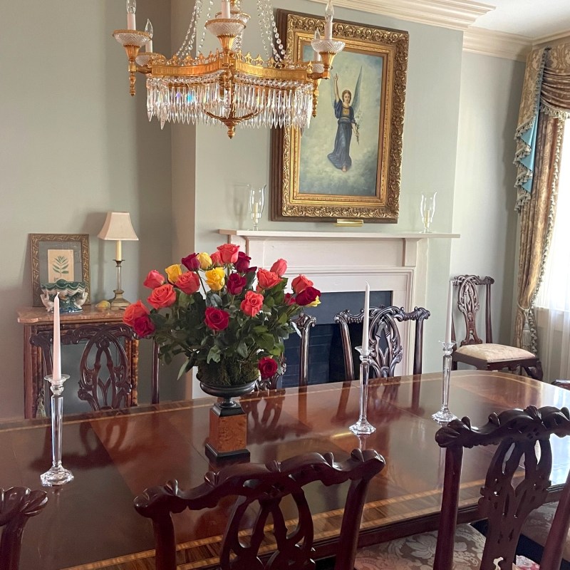 a living room filled with furniture and a fire place