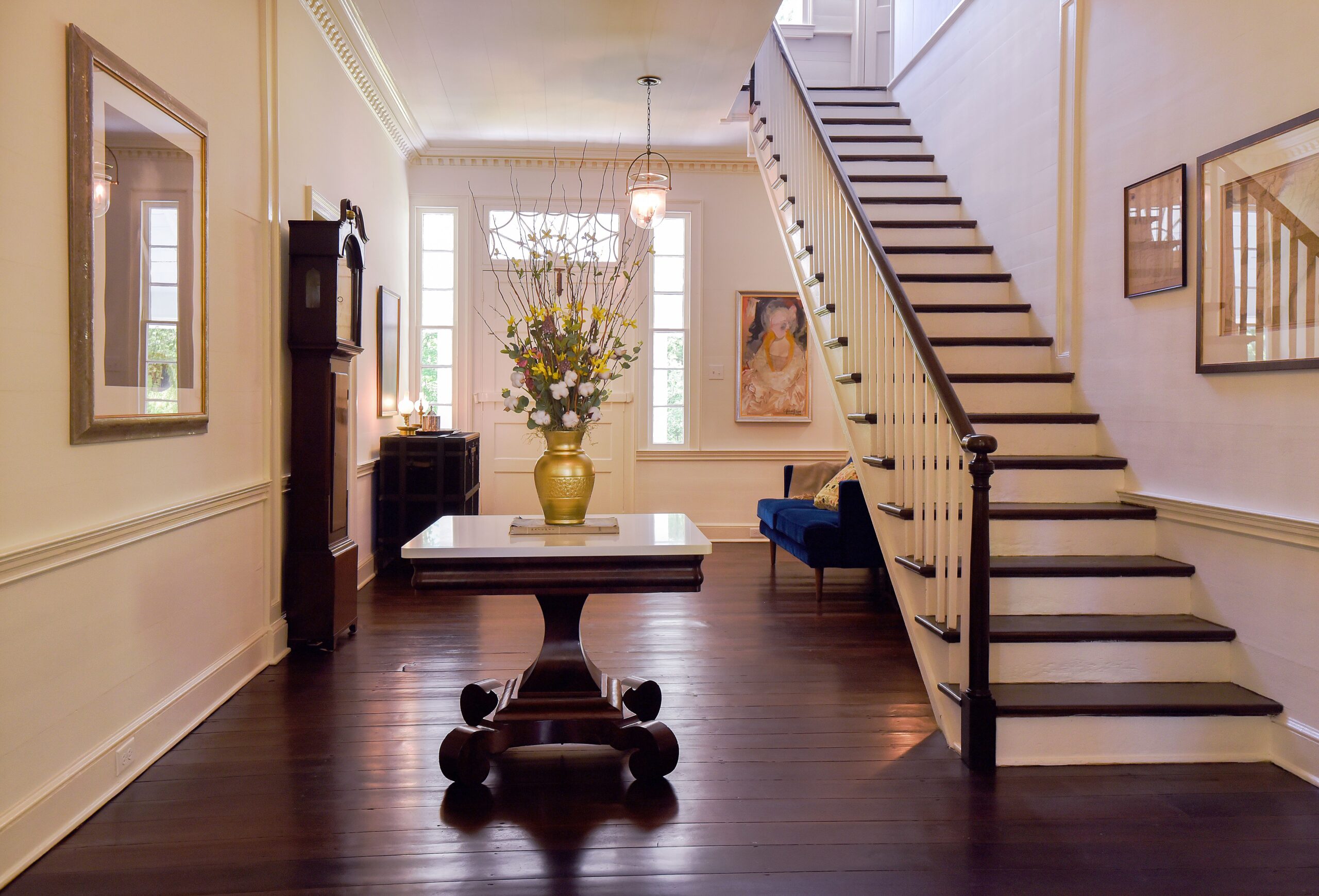 a living room filled with furniture and a fire place