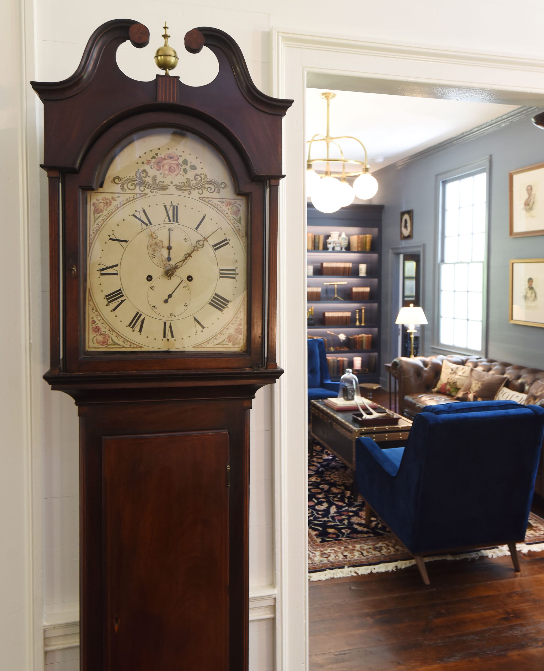 a clock sitting in the middle of a room