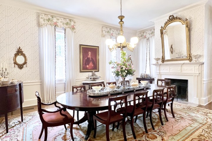 a room filled with furniture and a large window