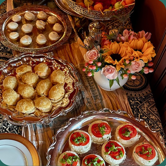 a table topped with plates of food on a plate