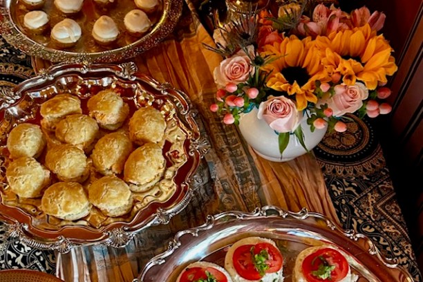 a table topped with plates of food on a plate